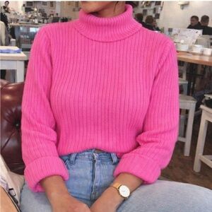 Pink turtleneck sweater
